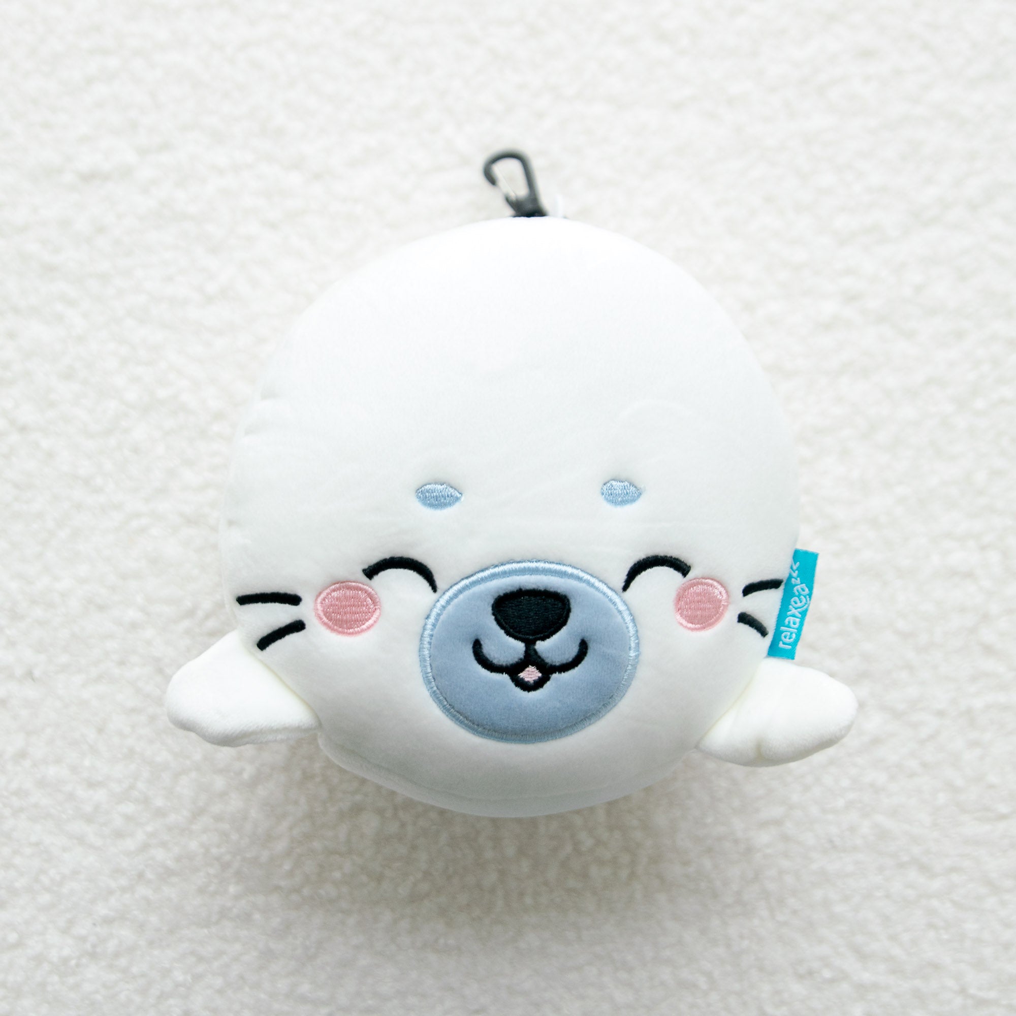 Coussin de voyage 2-en-1 avec masque - Kai le Phoque