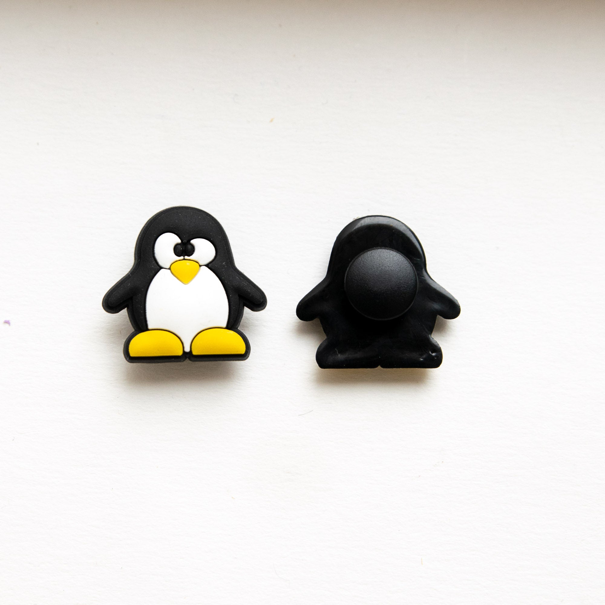 Accessoires pour Crocs Pingouin Noir