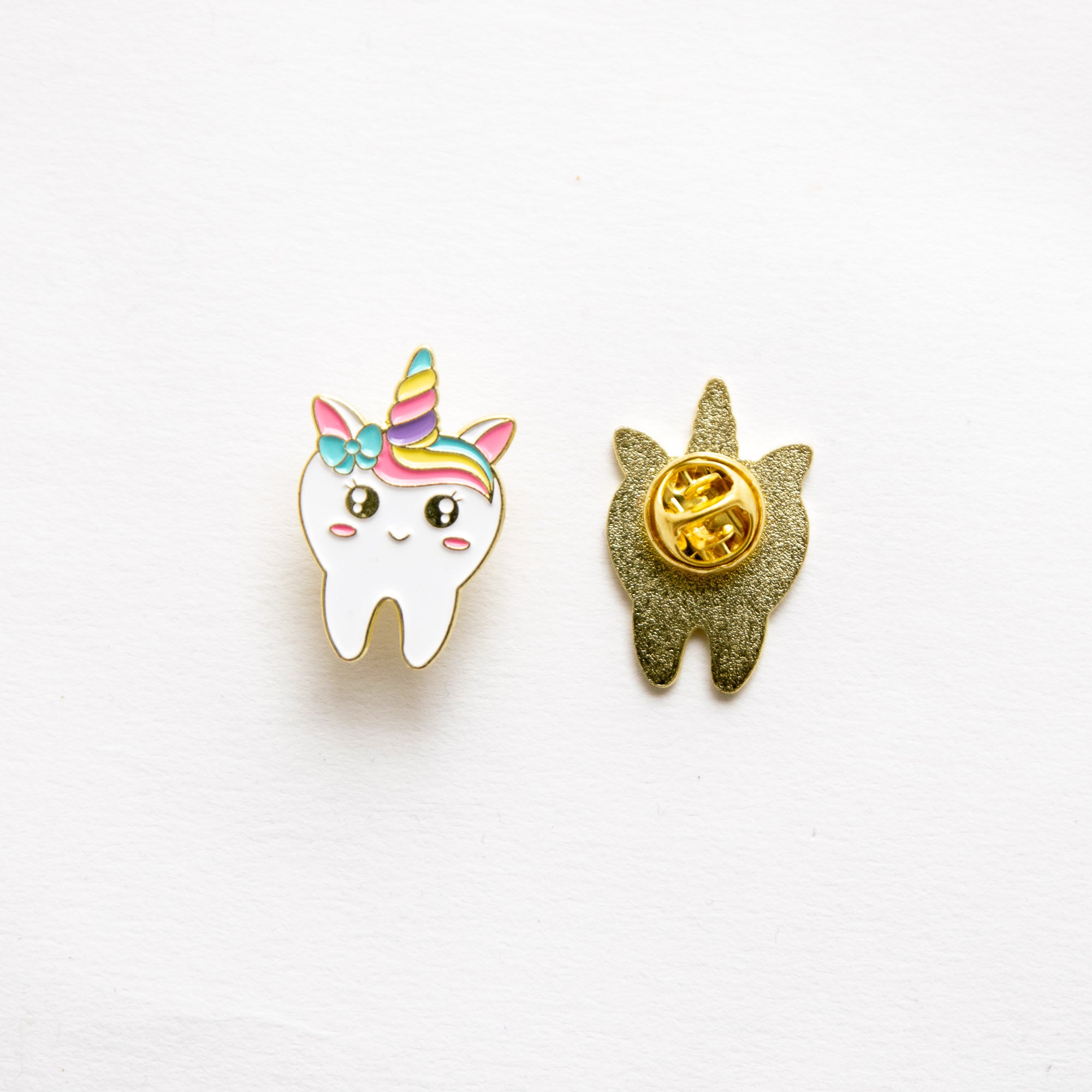 Pin's Dent Licorne