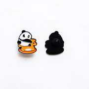 Pin's Panda sur un Cheval à Bascule